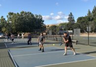 People playing pickleball on a court in San Jose, California