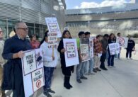 People protesting with signs in San Jose, California