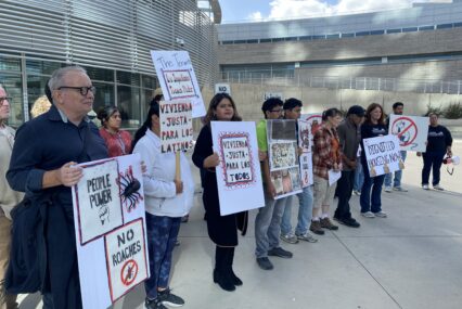 People protesting with signs in San Jose, California