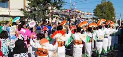 Japantown People waving fans at a Japantown cultural festival in San Jose, California
